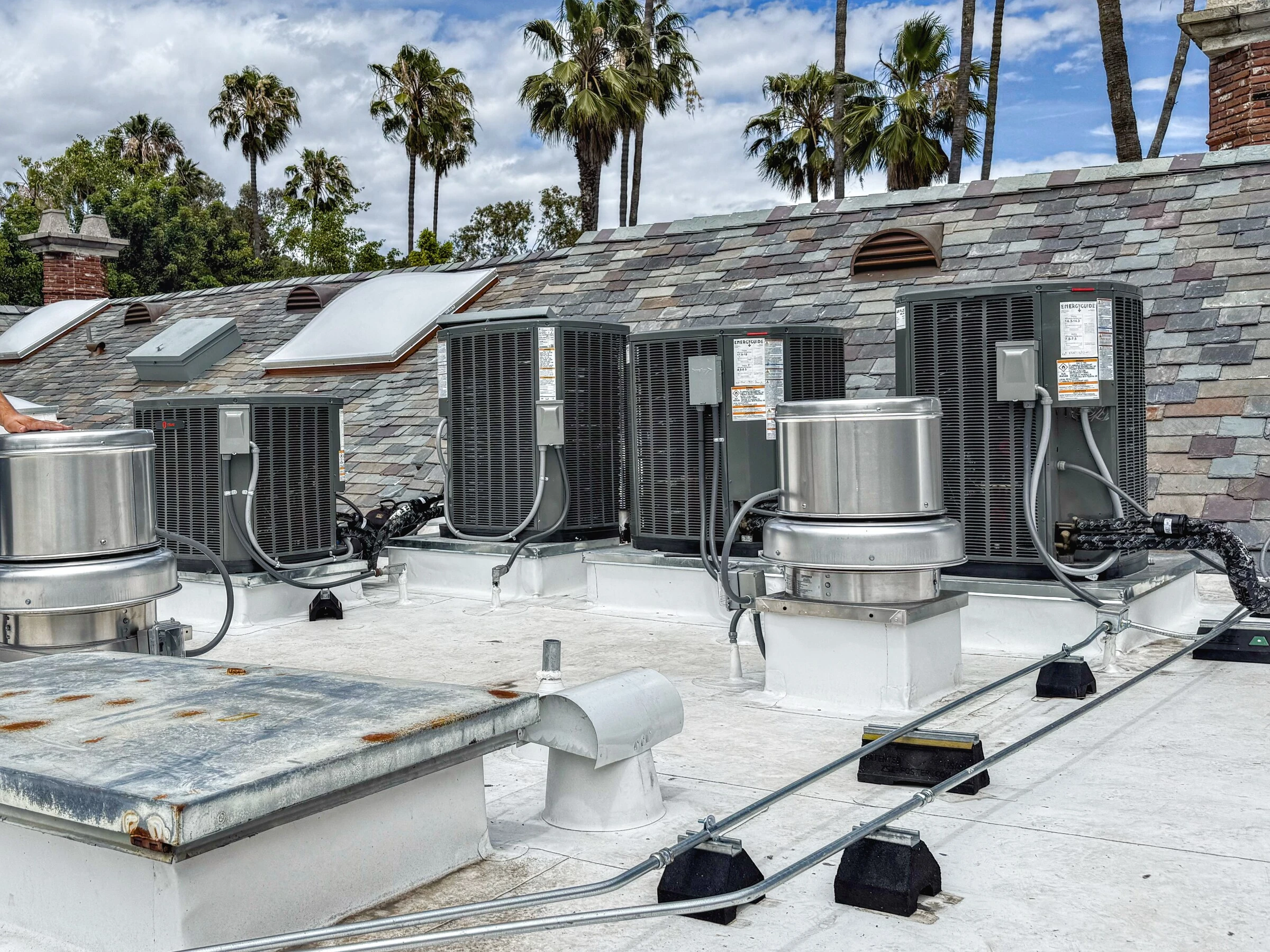 New rooftop condensers installed on the same roof.