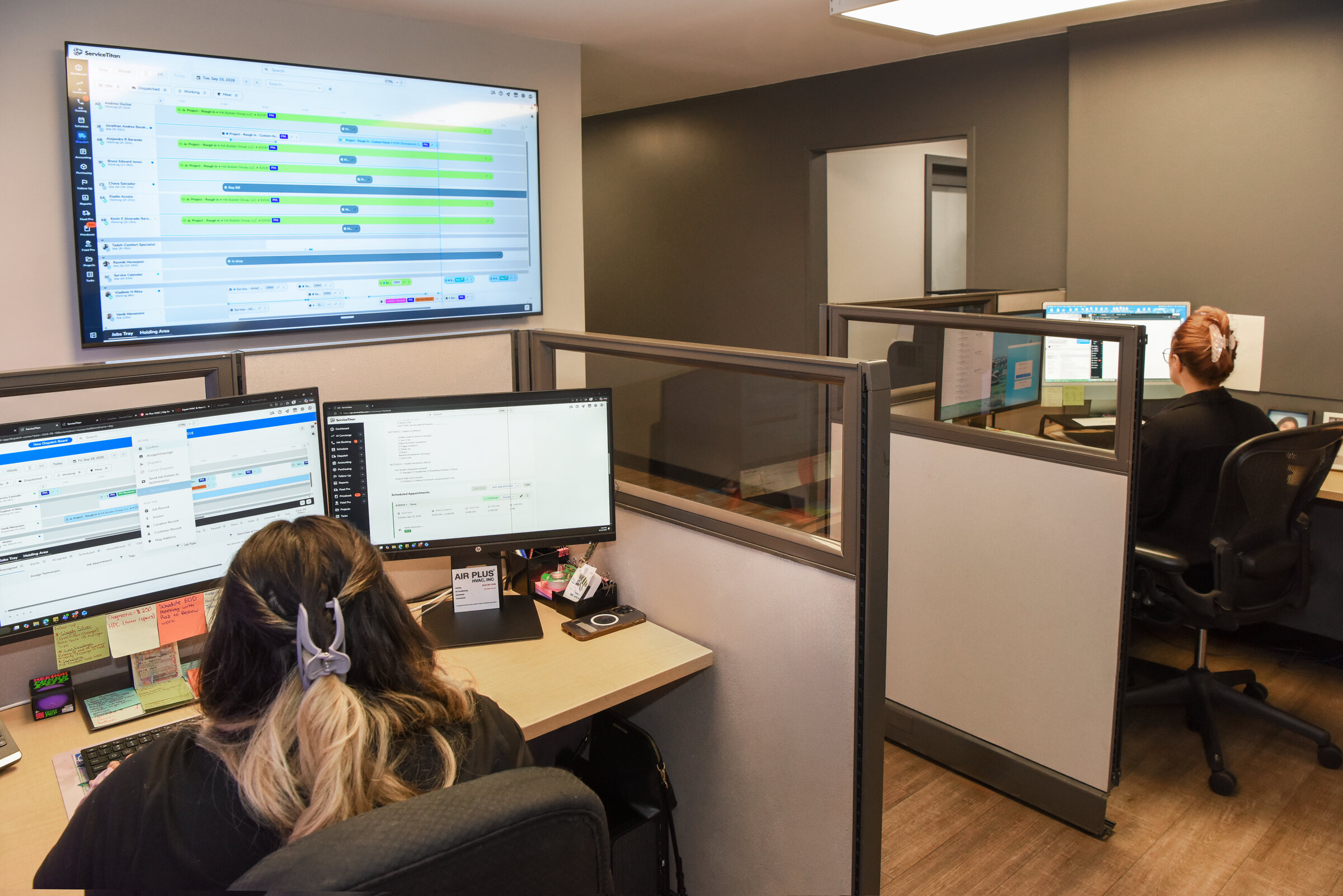 Air Plus office team scheduling HVAC service calls for Los Angeles customers
