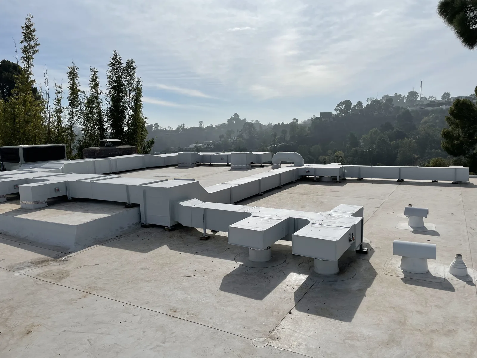The same roof after white ductwork was installed.